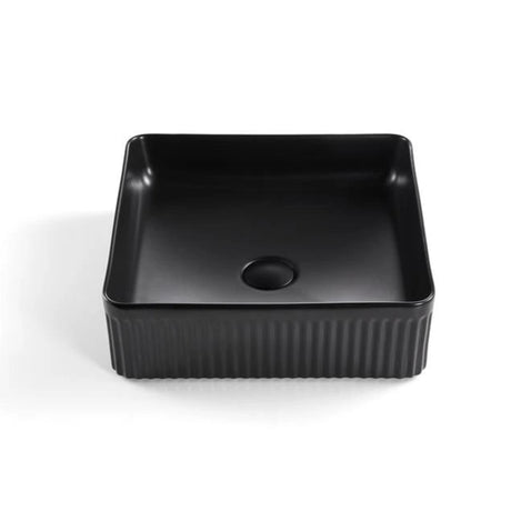 Black rectangular basin with ribbed texture on a white background