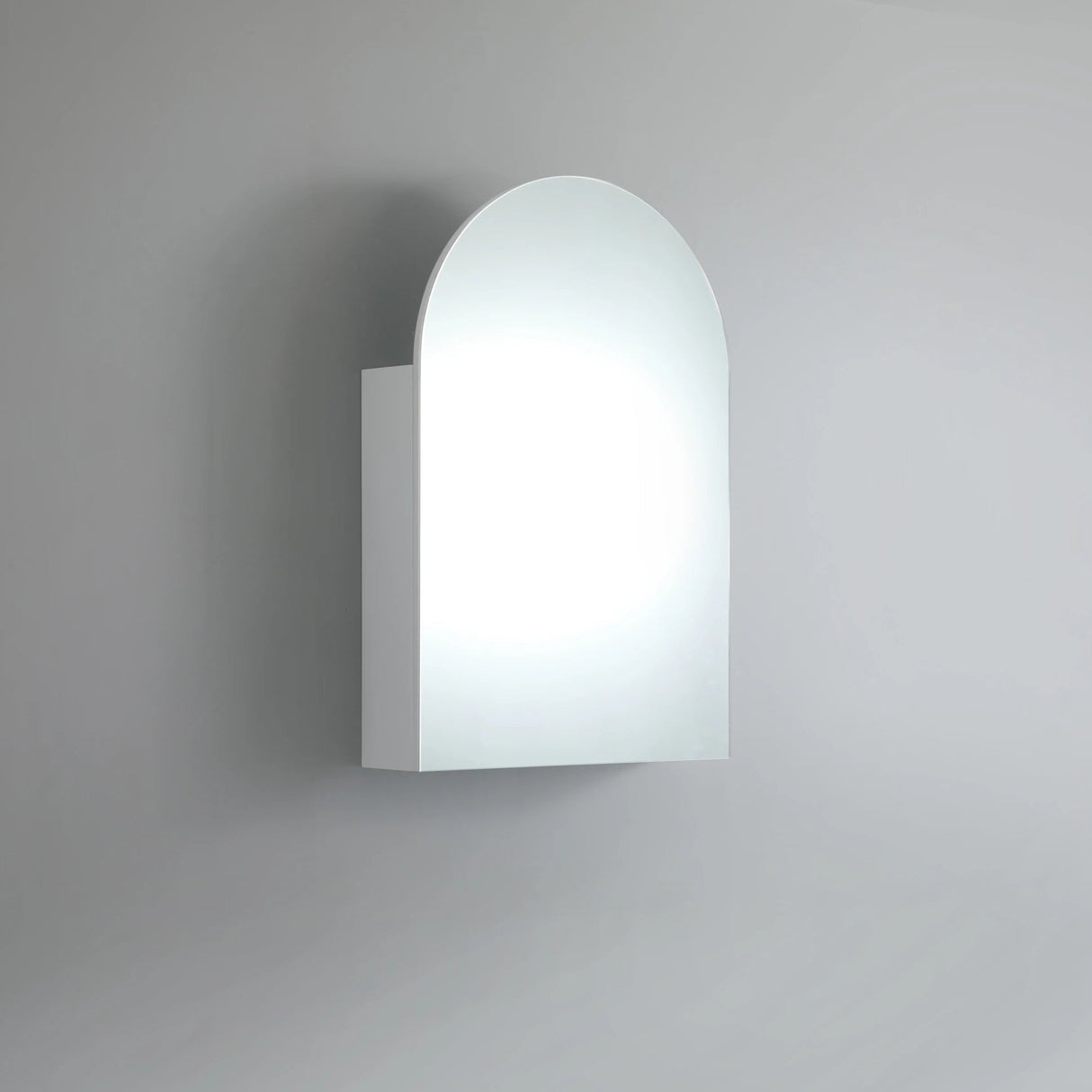 Wall-mounted light fixture with a curved design on a gray background