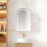 Athena arch LED shaving cabinet 500 x 800mm in matte white with the front LED light on, mounted above a bathroom vanity