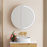 Athena round LED shaving cabinet 750mm in matte white with the front LED light on, mounted above a bathroom vanity