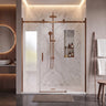 Brushed bronze (copper) frameless 3 panel sliding shower screen with centre sliding door across a wide marble shower recess