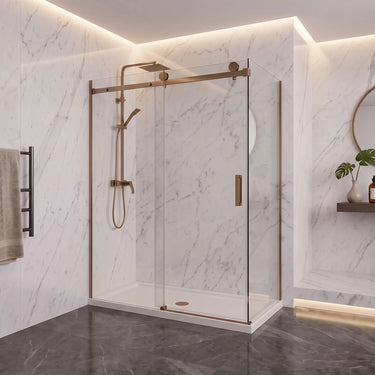 Brushed bronze (copper) frameless corner sliding shower screen with 10mm glass sliding door and return panel in a marble bathroom