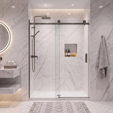 Brushed gun metal frameless wall to wall sliding shower screen with 10mm clear glass sliding door in a white marble bathroom