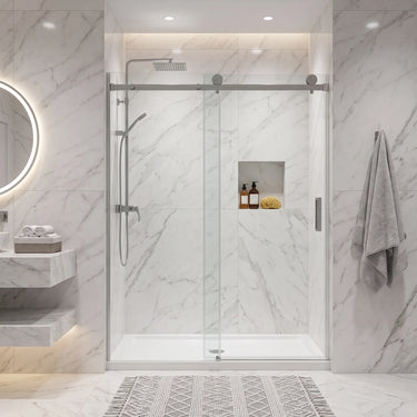 Brushed nickel frameless wall to wall sliding shower screen with 10mm clear glass sliding door in a white marble bathroom