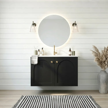 Chester 600mm Matte Black Hampton wall hung vanity with arched doors, styled bathroom