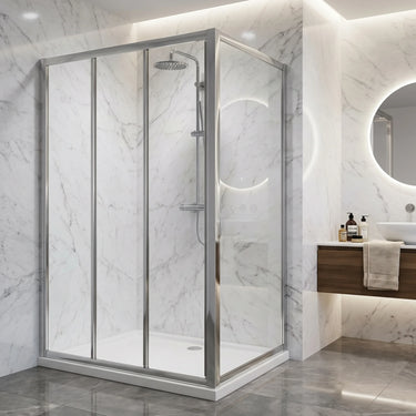 Chrome L-shaped corner sliding shower screen with 3 door slider and return panel on a shower base