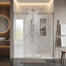 Chrome frameless 3 panel sliding shower screen with centre sliding door across a wide marble shower recess