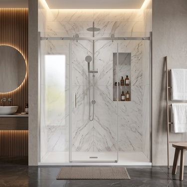 Chrome frameless 3 panel sliding shower screen with centre sliding door across a wide marble shower recess