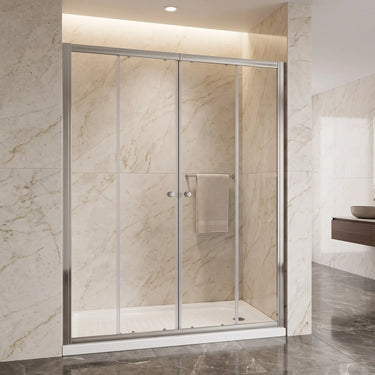 Chrome semi frameless centre opening sliding shower screen installed wall to wall in a marble bathroom