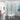 Chrome semi frameless curved sliding shower screen on a quarter-round corner shower base