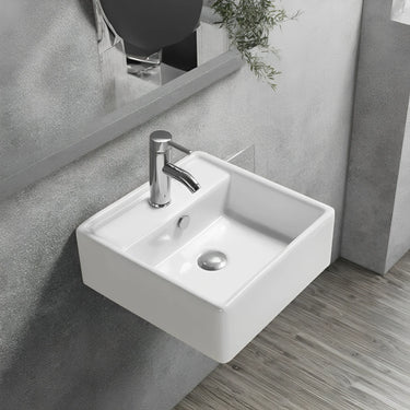 Crete 470mm square gloss white wall hung basin with tap hole mounted on a tiled wall