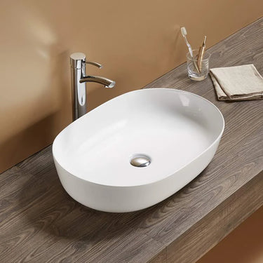 Ellips 490mm rectangular above counter basin in gloss white on a bathroom vanity top