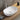Ellips 490mm rectangular above counter basin in matte white on a bathroom vanity top