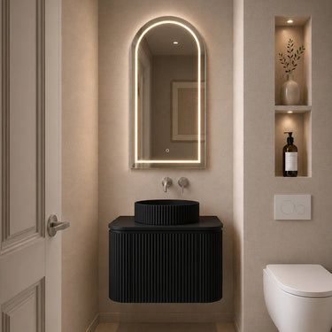 Estella fluted curved wall hung vanity in Matte Black with a round vessel basin styled in a modern Australian powder room - RJ Bathroom