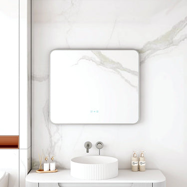 Maia 900x750mm rectangular motion sensor LED mirror with gun metal frame in a bathroom above a round basin
