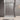 Matte Black semi frameless wall to wall sliding shower screen with 6mm clear glass sliding door in a tiled bathroom