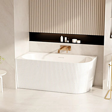 Rose 1500mm fluted V-groove left corner bath in matte white installed in a modern bathroom