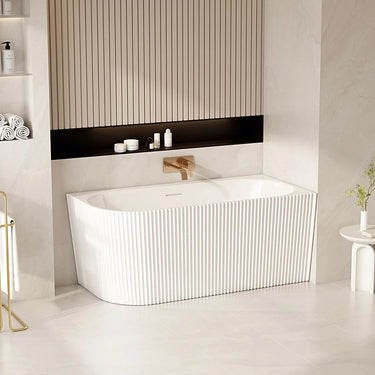 Rose 1500mm fluted V-groove right corner bath in matte white installed in a modern bathroom