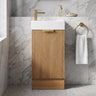 Scandinavia 450mm Prime Oak Fluted Freestanding Vanity with kickboard and poly marble basin top in a marble powder room - RJ Bathroom