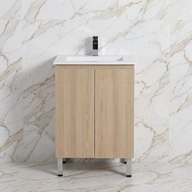 Scandinavia 600mm Classic Oak Timber Freestanding Vanity shown with a white ceramic basin top against marble wall tiles - RJ Bathroom