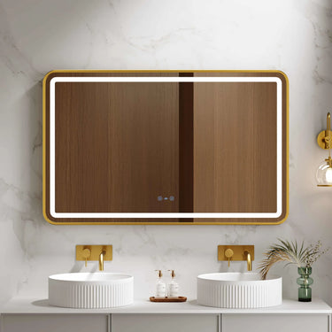 Venus 1200x750mm rectangular front-lit motion sensor LED mirror with brushed gold frame in a bathroom above a round basin