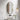 Venus 500x900mm oval front-lit motion sensor LED mirror with matte black frame in a bathroom above a round basin