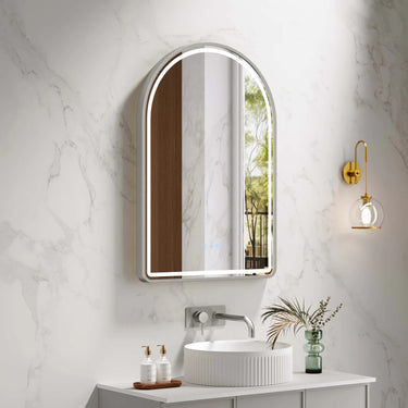 Venus 600x900mm arch front-lit motion sensor LED mirror with brushed nickel frame in a bathroom above a round basin