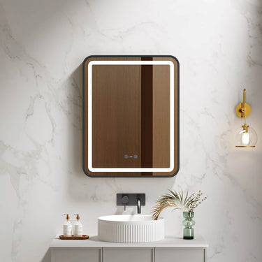 Venus 750x900mm rectangular front-lit motion sensor LED mirror with matte black frame in a bathroom above a round basin