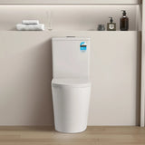 White toilet in a bathroom setting with a neutral color scheme