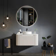 white wall hung vanity with white round basin and a round LED mirror on the wall