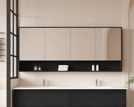 Modern bathroom with black and white vanity, mirror, and toiletries.