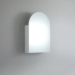 Wall-mounted light fixture with a curved design on a gray background