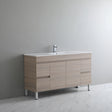 Bathroom vanity with sink against a gray wall