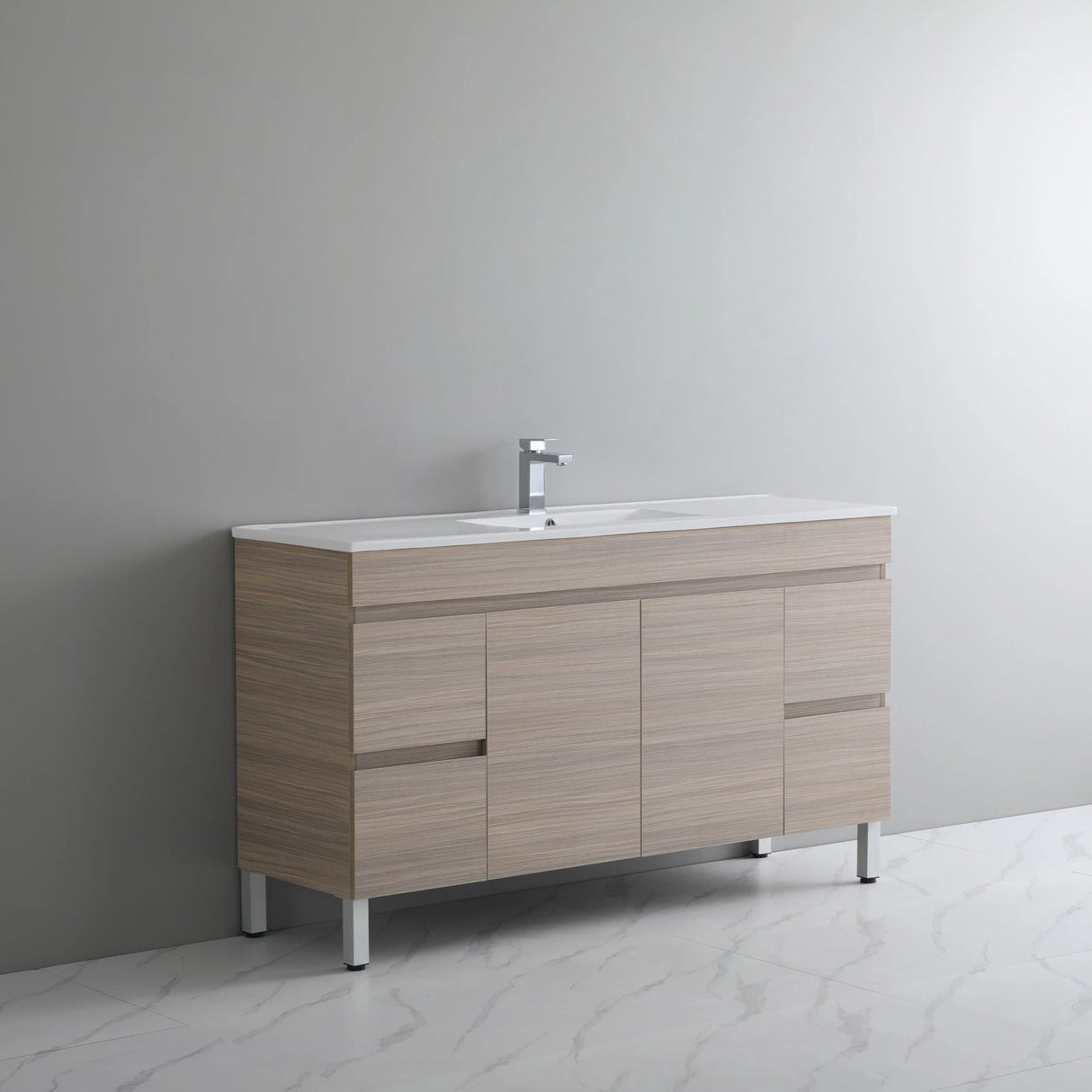 Bathroom vanity with sink against a gray wall