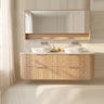 Artis 1800mm Classic Oak fluted curved wall hung double bowl vanity styled in a light stone bathroom with twin above-counter basins - RJ Bathroom