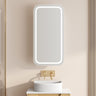 Athena rectangle LED shaving cabinet 450 x 900mm in matte white with the front LED light on, mounted above a bathroom vanity