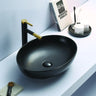 Carey 520mm oval above counter basin in matte black on a white bathroom bench