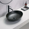 Carey 520mm oval above counter basin in matte black marble look on a bathroom bench