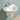 Carrida 565mm gloss white wall hung care basin with tap hole, shown with half pedestal which is not included