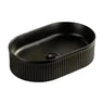 Cascade fluted oval above counter basin 490x310mm in matte black ceramic, CA4931-MB