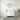 Chester 600mm Matte White Hampton wall hung vanity with arched doors, styled bathroom