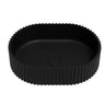 Ellips Fluted 480mm solid surface stone oval above counter basin in matte black