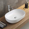 Ellips 490mm rectangular above counter basin in matte white on a bathroom vanity top