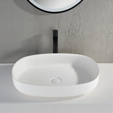 Ellips 600mm solid surface stone above counter basin in matte white with black tall basin mixer