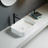 Kliff 500mm rectangular above counter basin in matte Carrara white marble look on a white bathroom bench