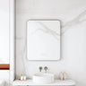 Maia 600x750mm rectangular motion sensor LED mirror with gun metal frame in a bathroom above a round basin