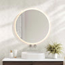 Mercio Luna 900mm round frameless backlit LED mirror in a bathroom above a round basin