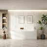 Nova 1500mm right corner bath in gloss white with ultra-thin edge, installed against a tiled bathroom wall