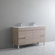 Bathroom vanity with two sinks against a gray wall