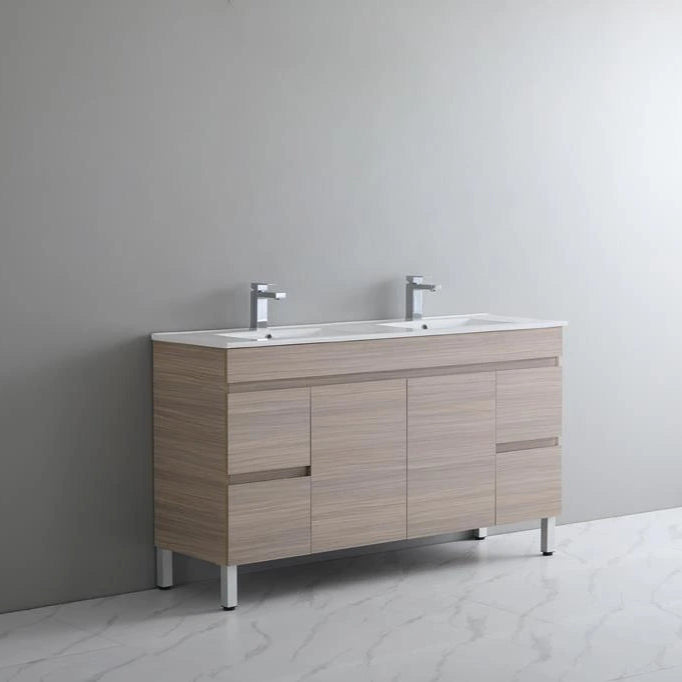 Bathroom vanity with two sinks against a gray wall